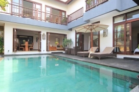 Set amidst the peaceful charm of rice terraces in Canggu, Southern Bali and just a short drive from fashionable Seminyak with all famous restaurants, night clubs, trendy boutiques, this three bedroom has been set up to relax and enjoy during your holiday in Bali. On walking distance to Desa Seni (yoga resort), The Canggu Club and Canggu Deli (western supermarket), this holiday villa offers you all western luxury in a tropical setting. The holiday rental villa consists of 3 air-conditioned bedrooms with en suite bathrooms, one master bedroom upstairs and two spacious bedrooms on the main floor. A semi open lounging, dining area is overlooking the swimming pool and elevated sun deck. A fully equipped kitchen completes the living area. This three bedroom villa is perfect for a family for an affordable price.Service and Facilities, Canggu