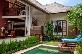 This holiday rental villa is a perfect hideaway in the center of Seminyak.  It is on walking distance of the shopping and dinning area of Seminyak, and just a five minutes drive from the Petitenget area, where the trendy spots as Ku De Ta, Sarong, La Lucciola, Hu'u Bar and The Living Room are located. The villa offers you a feeling of being home away from your home. The villa is designed in a modern Balinese style with "alang-alang" roof. Two bedrooms are located downstairs and one bedroom upstairs, each bedroom is air-conditioned with en suite bathroom and an outdoor shower. The hospitality service from the staff makes your stay comfortable and enjoyable.Service and Facilities, Seminyak