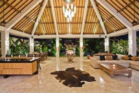 Large and comfortable villa with private pool, in Umalas, Bali, Indonesia for a maximum of 6 persons.The holiday villa is located in Umalas, a popular area right next to Seminyak and is situated on a slight slope in the middle of stunning green rice fields. The villa offers an atmosphere that perfectly suits every seasoned modern holiday maker. The unique location of villa Shine will ensure that you will be perfectly situated to enjoy both the exciting entertainment as the natural environment and culture Bali has to offer.The popular restaurant Bali Buddha and authentic coffeehouse Cafe Moka are a short stroll away. A ten minute scooter ride will take you to the well known beach spots like Echo Beach, Batu Belig Beach and even Double Six Beach to enjoy the famous Bali waves and beautiful tropical beaches. Seminyak, Oberoi and Petitenget, famous for it's wide range of boutique shops, high quality restaurants, bars and nightclubs like Ku De Ta, Potato Head Beach Club and Metis are a short ride away. Villa Shine is only a heartbeat away from the entertainment that the vibrant nightlife and shops of Bali have to offer, here you will experience complete serene tranquillity while surrounded by stylish luxury.The villa is completely secluded and offer 100% privacy. The modern large semi open dining and living area perfectly blend in with the lush green tropical garden and the stylish swimming pool. The semi open area can be closed by using the semipermeable see through shutters to ensure comfortable lounging during tropical weather conditions while keeping the sense of spacious outdoor living. Both first floor double bedrooms offer a classic Balinese view overlooking the rice fields and are supported by spacious balconies. The view of mount Agung, the stunning volcano, can be viewed from one of the balconies. All three large double bedrooms are equipped with flatscreen TV's and DVD players and have en suite design bathrooms including large bathtubs. One of the bathrooms is open air. A fully equipped luxurious kitchen is part of the semi open air living area and has all the necessary modern details in order to enjoy delicious meals with your family and friends.Villa Shine is the perfect hideaway to spend quality time with family and friends in complete privacy, to experience the Balinese Zen culture and to enjoy the exciting nightlife & shopping of Seminyak and its surroundings.Interior, Umalas