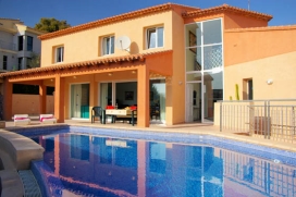 Fantastic holiday rental villa of modern style with seaview and situated in El Portet of Moraira with capacity for maximum of 10 people. Of recent construction, with air conditioning in the five bedrooms and in the lounge - dining room., Moraira