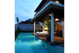 Luxury private holiday rental villa ideally situated amid tranquil verdant rice fields. Silq rests on the foundation of exclusivity as well as premier hospitality it offers its discerning guests. Built simply on elemental layers that are both natural and crafted, silq nourishes this harmonious replenishment with spectacular surroundings and the good wealth of cool clear waters in fields of grain. The villa is located in the up-and-coming Kerobokan neighborhood of Bali, Indonesia. This new luxury villa offer a contemporary aesthetic in a well-appointed environment, complementing old world Balinese hospitality. Guests will find pampering from their own private butler, a series of upscale amenities and supreme attention to detail to ensure their comfort and peace of mind.The villa features a private Jacuzzi and an extended infinity-edge swimming pool., Seminyak